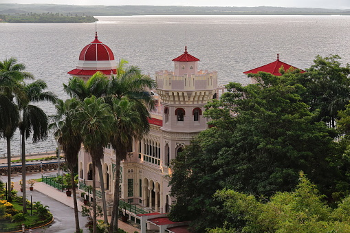 Cienfuegos, Cuba-October 11, 2019: Palacio de Valle Palace, architectural National Heritage Memorial reminiscent of Spanish-Moorish art with Romanesque, Gothic, Baroque and Mudejar styles influences.