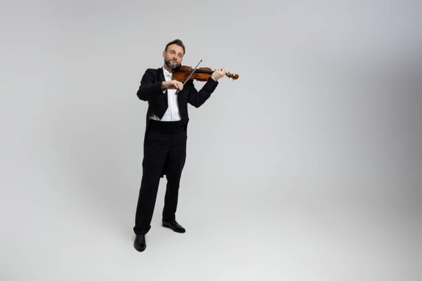 istock Man classic violinist at musical elegant performance 2150704703
