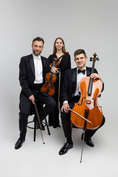 istock Elegant musicians with contrabass and violins 2150704970