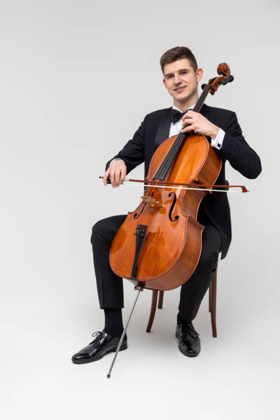 istock Man artist wearing tuxedo playing contrabass 2150705006