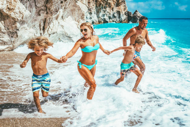 istock Family On The Beach 2150706547