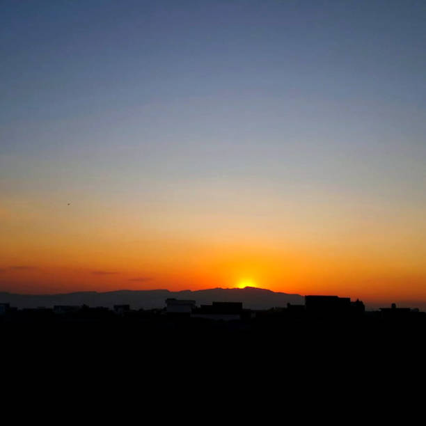 istock Beautiful sunrise picture blue sky yellow shade 2150707467