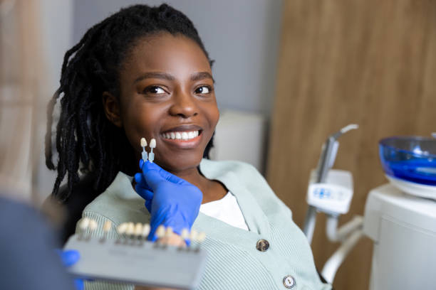 istock Smiling dark-skinned woman at the dentists looking contented 2150707898