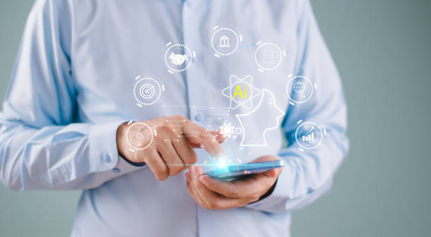 istock AI help analysis business concept. Artificial intelligence technology assistance in futuristic daily life, customer service. Businessman use Smartphone AI application. Modern technology to help work 2150709850
