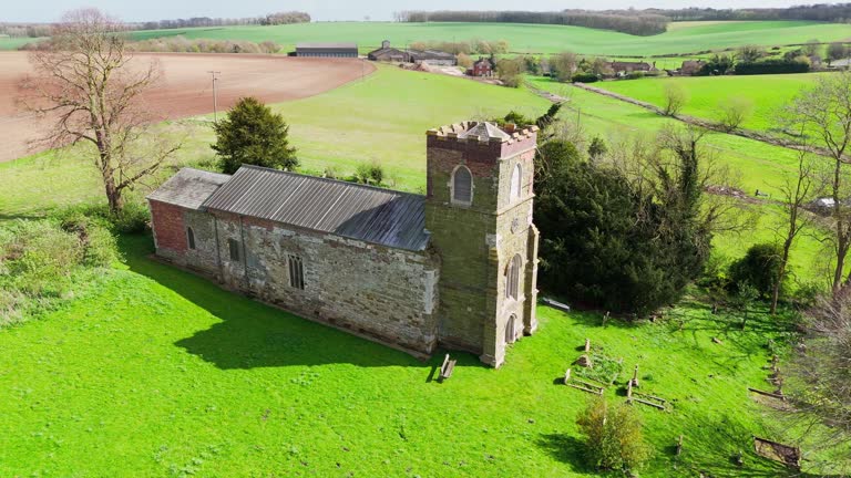 Aerial drone footage of a small Lincolnshire village called Burwell in the UK. Typical English rural village scene.