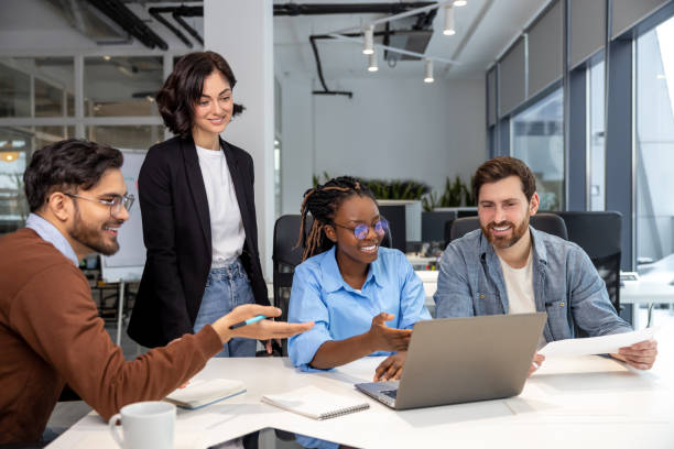 istock Office employees people discussing risky ideas working on laptop in office 2150716277
