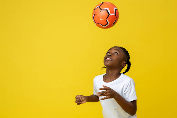 istock Happy little multiracial boy playing with ball copy space for advertisement 2150717413
