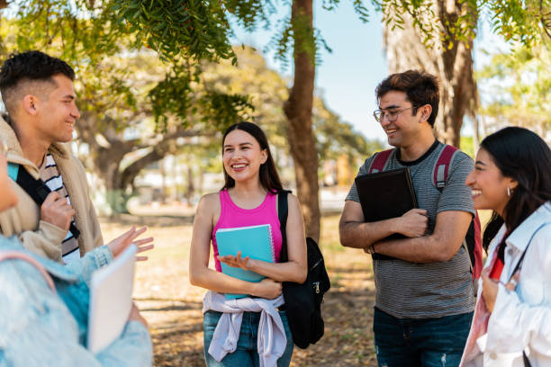 istock Young student friends talking outdoors 2150720365