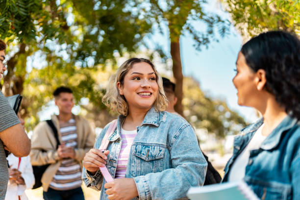 istock Young student women talking and walking outdoors 2150720388