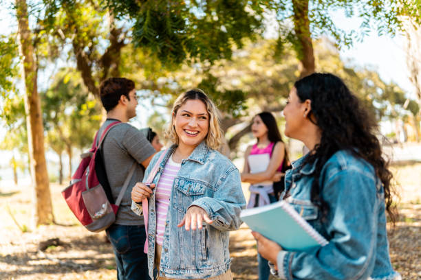 istock Young student women talking and walking outdoors 2150720402