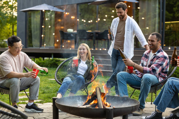 istock Friends making picnic in the backyard at dinner time 2150723411