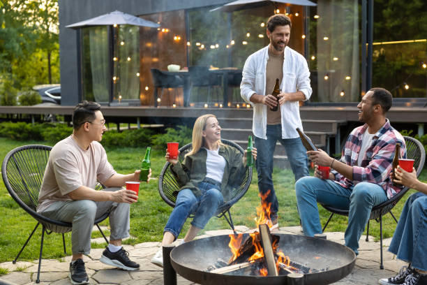 istock Friends making picnic in the backyard at dinner time 2150723425