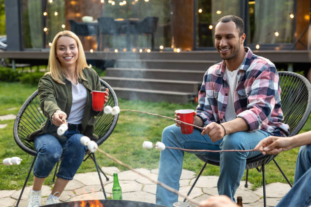 istock Friends making picnic in the backyard at dinner time 2150723427