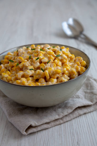 istock Homemade Slow Cooker Creamed Corn in a Bowl, side view. 2150724554
