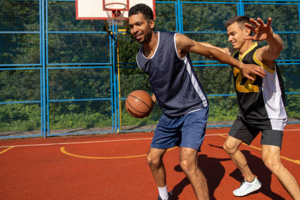 istock Basketball players have training outdoor playing together 2150725206