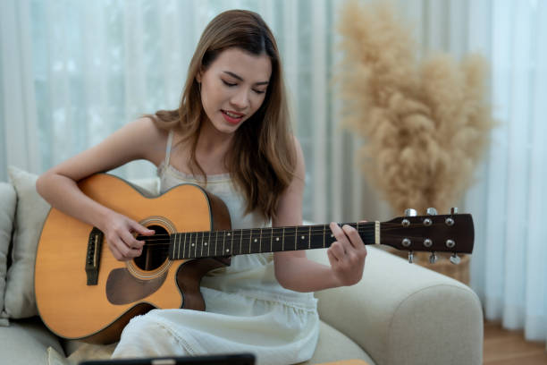 istock Woman Composing Music at Home 2150731419