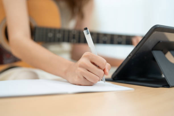 istock Woman Composing Music at Home 2150731423