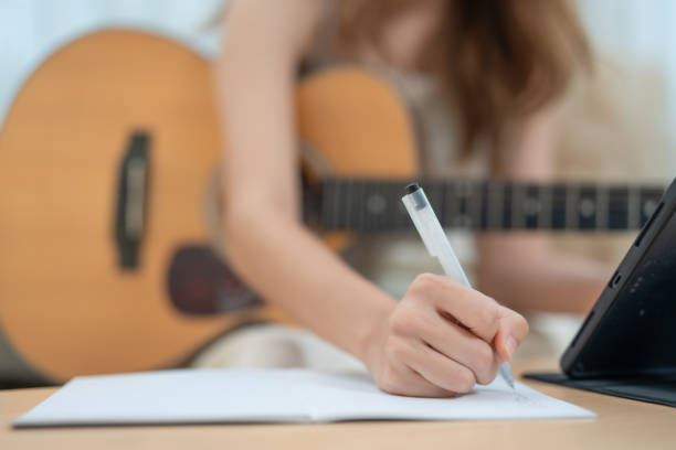 istock Woman Composing Music at Home 2150731424