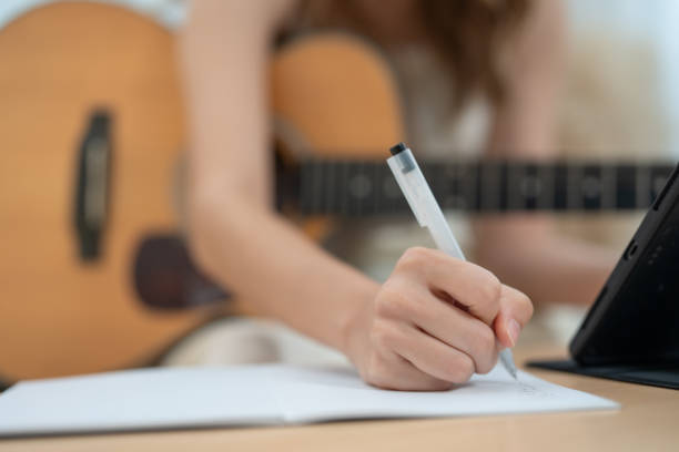 istock Woman Composing Music at Home 2150731428