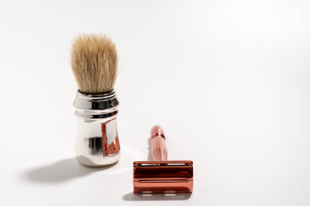 istock Metal razor and pen brush on a white background. 2150731467