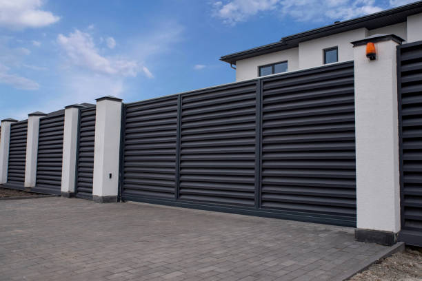 Automatic sliding gate with shutters Automatic sliding gate with shutters automatic garage door stock pictures, royalty-free photos & images