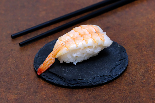 Shrimp sushi, salmon eggs sushi and foie gras sushi. Top view