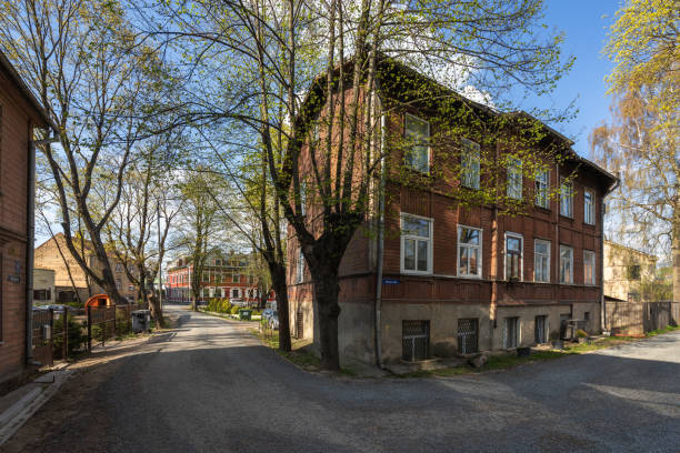 Riga, Latvia - April 28, 2024: Wooden buildings on Strazdu Street in the residential area of Agenskalns