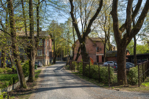 Riga, Latvia - April 28, 2024: Wooden buildings on Strazdu Street in the residential area of Agenskalns