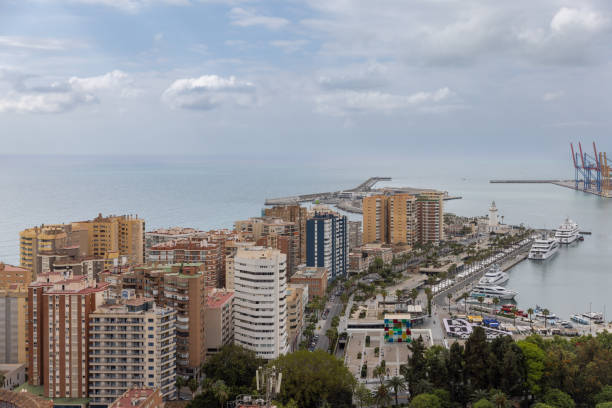 Malaga, Spain - Apr 23th 2024: City of Malaga is located next to Mediterranean sea and many travellers come there by ships.