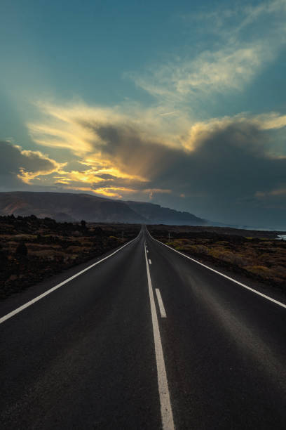 istock Long road in Lanzarote 2150743618