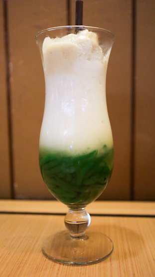 Tropical Delight Cendol in Glass with Creamy Coconut Milk and Green Jelly