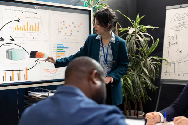 istock Business affiliates working together on new tasks in a boardroom 2150745082