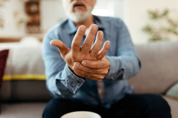 istock Man suffering pain on hands and fingers 2150746604
