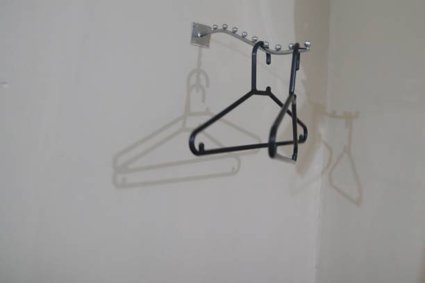 istock Black clothes hangers in the hotel 2150749129