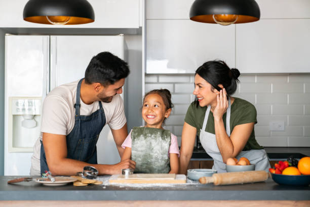 istock Loving family having fun baking at home 2150750451