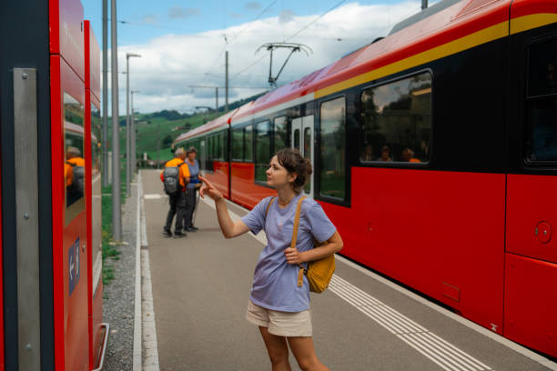 istock Woman checking train schedule for train on weekends to the mountains 2150750883