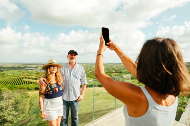 istock Family taking photos at a winery 2150751206