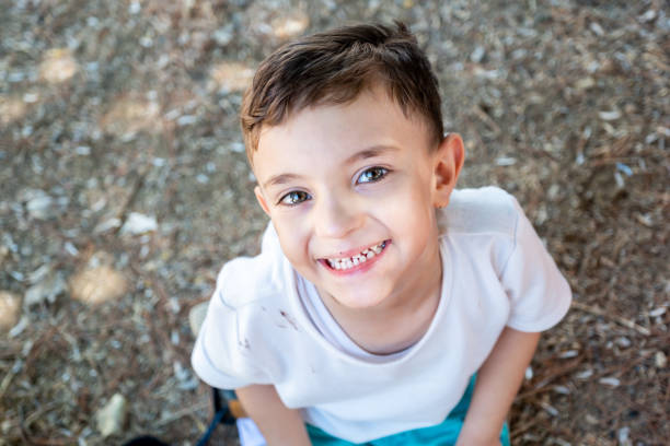 Happy muslim arabic boy playing in hte park