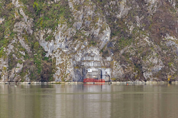Tekija, Serbia - March 15, 2024: Trajan Plaque Historic Landmark Tabula Trajana Relic in a Danube River Gorge Honoring Construction of a Roman Military Road in the 2nd Century.