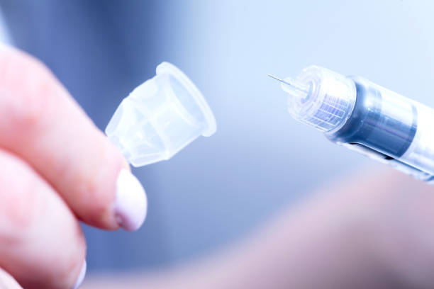 istock insuline pen is opened by woman 2150754432