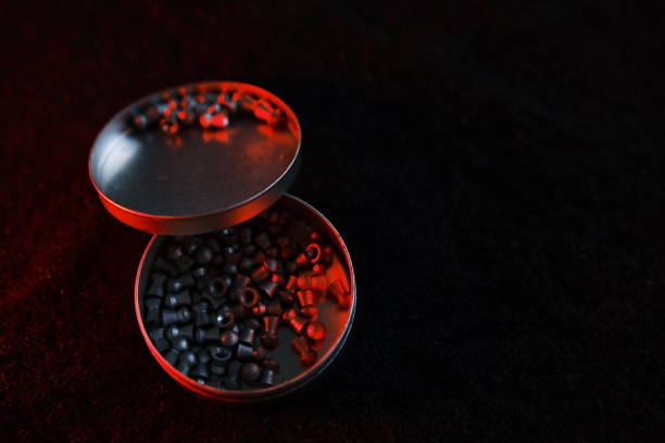 Lead air-gun pellets close-up background texture