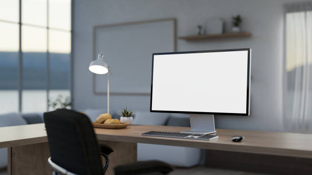 istock A contemporary private office or home office featuring a computer mockup on a wooden desk. 2150765206