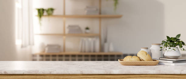 istock A display space on a white marble table showcases products in a minimalist room. 2150765217