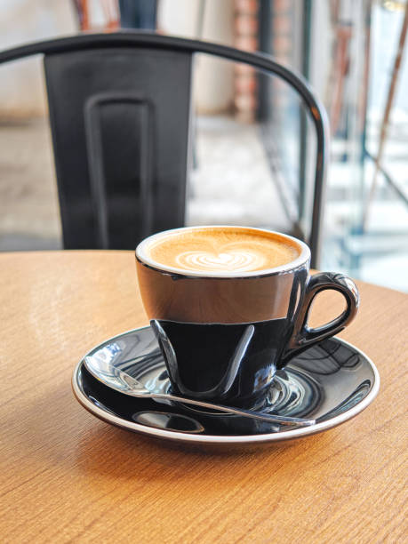 istock Cup of Flat White Coffee on wood table. 2150765960