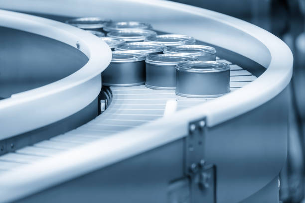 The high technology material handling process in canned food production by roller conveyor.