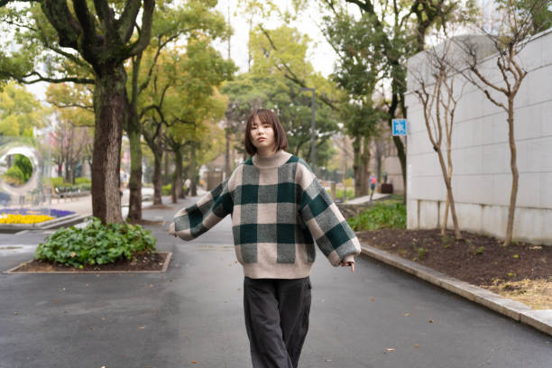 istock A woman having fun taking a walk 2150767610