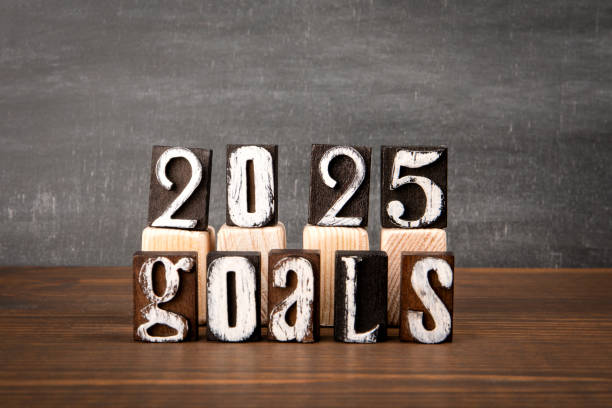 istock 2025 Goals Concept. Alphabet blocks on wood texture background 2150769465