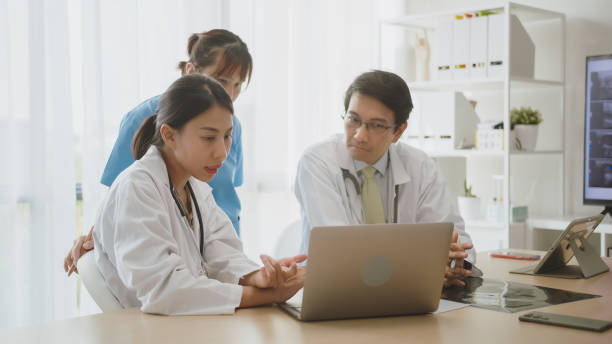 istock Intensive Medical Data Review by Clinical Team. 2150771593