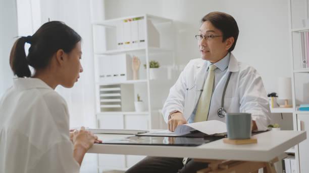 istock General Practitioner Discussing Health with Patient. 2150771668