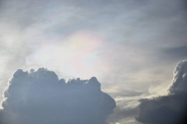 Rainbow in the clouds with the blue sky in the background. Cloudscape, skyscape, nature concept.